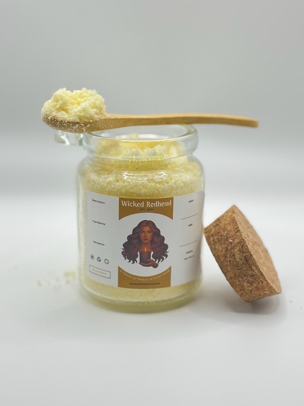 Wicked Redhead Bath Salts in glass jar with wooden spoon