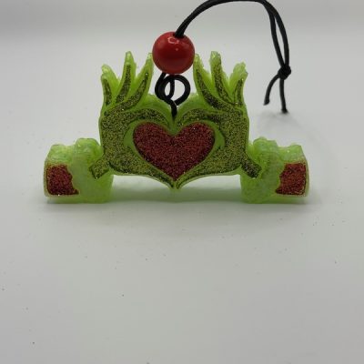 Green glitter heart aroma bead freshie with red heart center – handmade car freshener