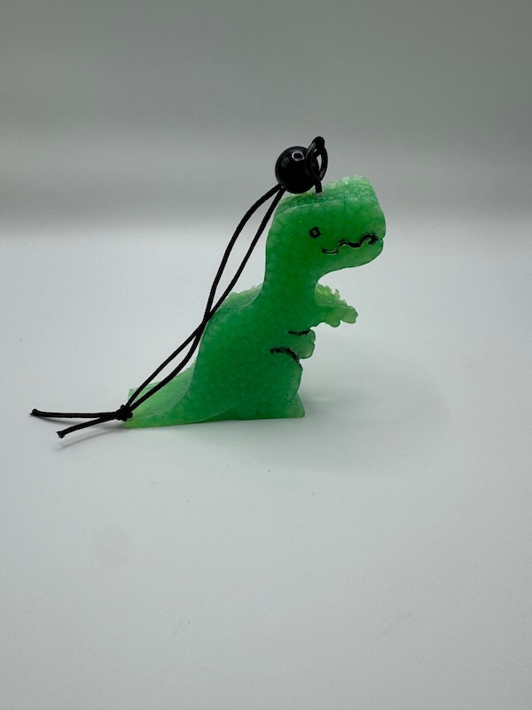 🦖 Wicked Roar™ Dino Freshie — Wicked Redhead Handcrafted Candle & Bath Collection dinosaur shaped car freshie handmade by Wicked Redhead