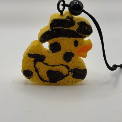 Dapper Duck freshie in bright yellow with black details and a small hat, handmade aroma