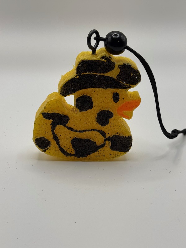 š¤ Dapper Duck⢠Freshie ā Wicked Redhead Handcrafted Candle & Bath Collection Dapper Duck freshie in bright yellow with black details and a small hat, handmade aroma